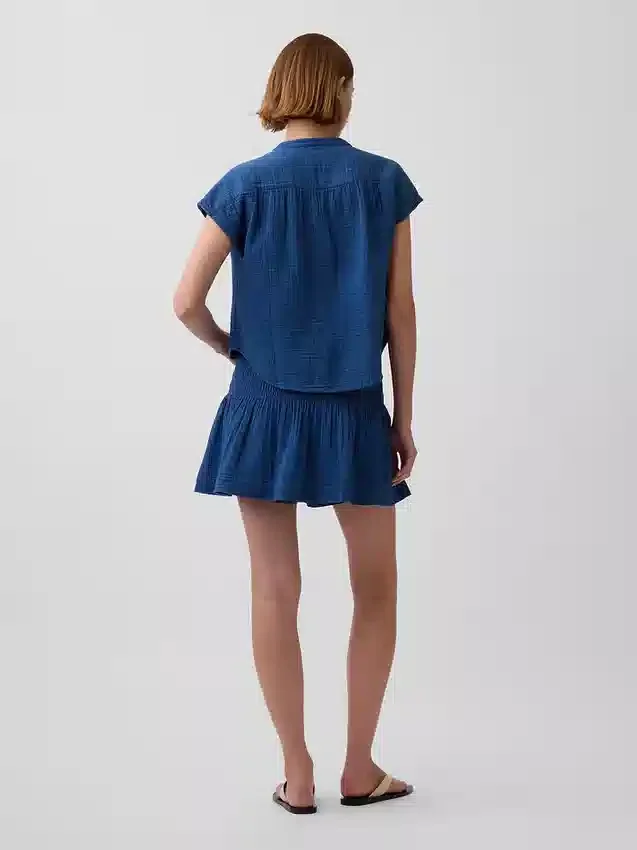 Mini-skort van katoenen gaasdenim met gesmokte taille