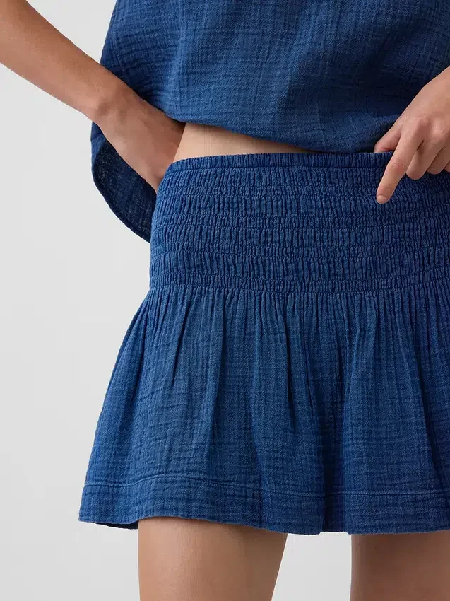 Mini-skort van katoenen gaasdenim met gesmokte taille