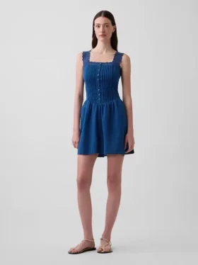 Minijurk met plooitjes en verlaagde taille