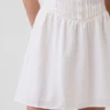 Minijurk met plooitjes en verlaagde taille