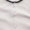 Modern geribbeld T-shirt met knoopsluiting en ronde hals