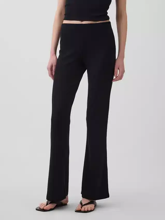Moderne wijde ribgebreide broek met uitlopende pijpen