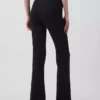 Moderne wijde ribgebreide broek met uitlopende pijpen