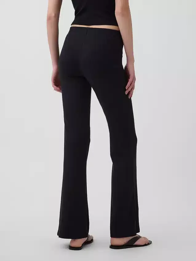 Moderne wijde ribgebreide broek met uitlopende pijpen