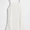 Moderne zwangerschapskleding-tanktop met schortkraag