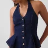 Nauwsluitende denim haltertop met peplum