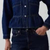 Nauwsluitende denimtop met peplum