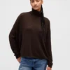 Oversized coltrui met pointelle-patroon