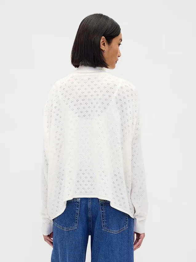 Oversized coltrui met pointelle-patroon
