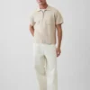 Oversized polo-trui met kwartrits en zak
