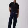Oversized polo-trui met kwartrits en zak