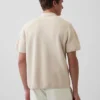 Oversized polo-trui met kwartrits en zak