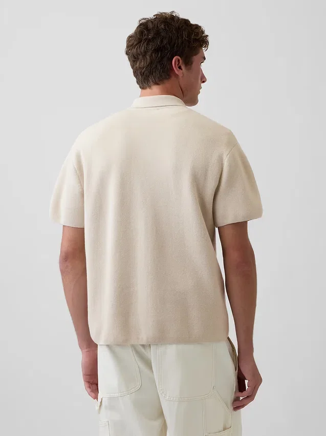 Oversized polo-trui met kwartrits en zak