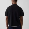Oversized polo-trui met kwartrits en zak