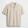 Oversized polo-trui met kwartrits en zak