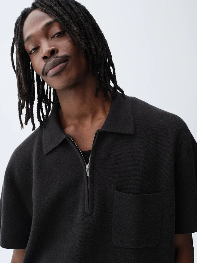 Oversized polo-trui met kwartrits en zak