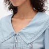 Peplumtop met kraag en V-hals