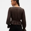 Peplumtop met V-hals en oogjes