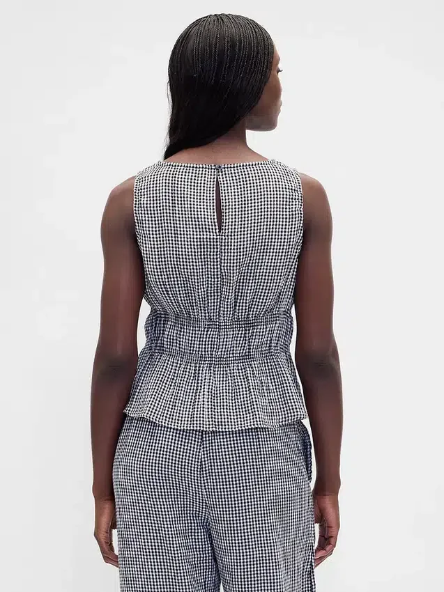 Peplumtop van katoenen gaas met gesmokte taille