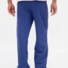 Relaxte joggingbroek met logo voor volwassenen, zware uitvoering