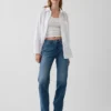 Relaxte rechte Jeans met middelhoge taille en gespleten zoom
