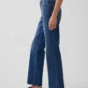 Relaxte rechte Jeans met middelhoge taille en gespleten zoom