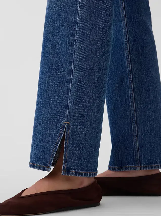 Relaxte rechte Jeans met middelhoge taille en gespleten zoom