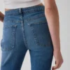 Relaxte rechte Jeans met middelhoge taille en gespleten zoom