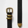 Riem van leer met korrelpatroon