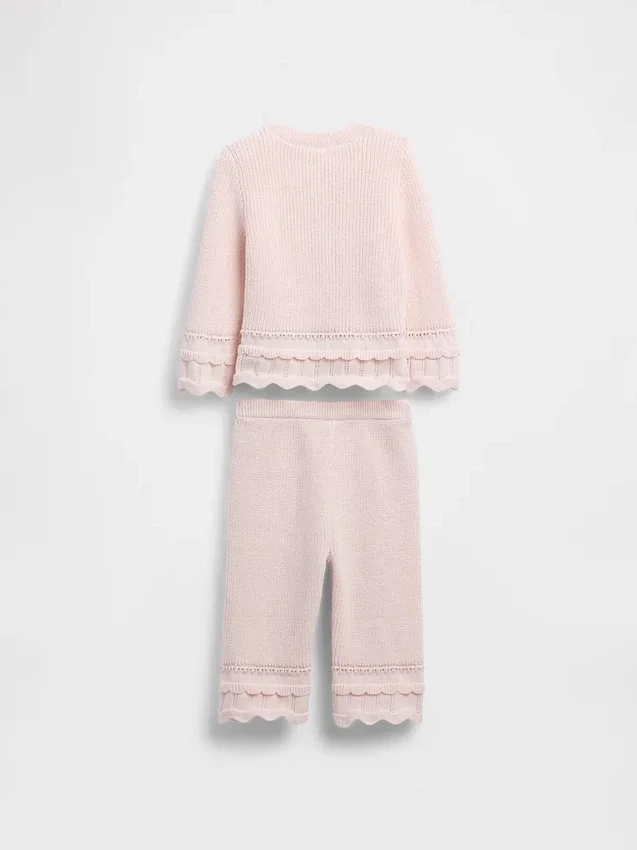 Set met geschulpte babytrui