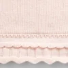 Set met geschulpte babytrui