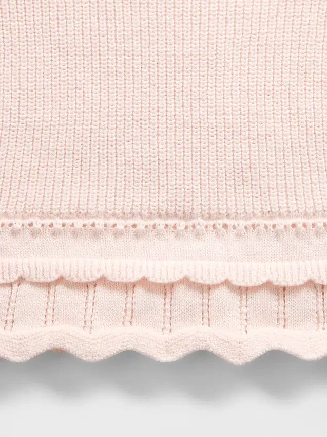 Set met geschulpte babytrui