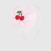 Sweet Wink-hoofdband met tule strik