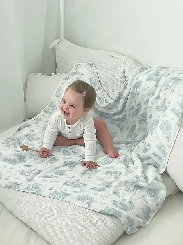 The Gilded Bird: bamboe babydeken met lente-toile-motief