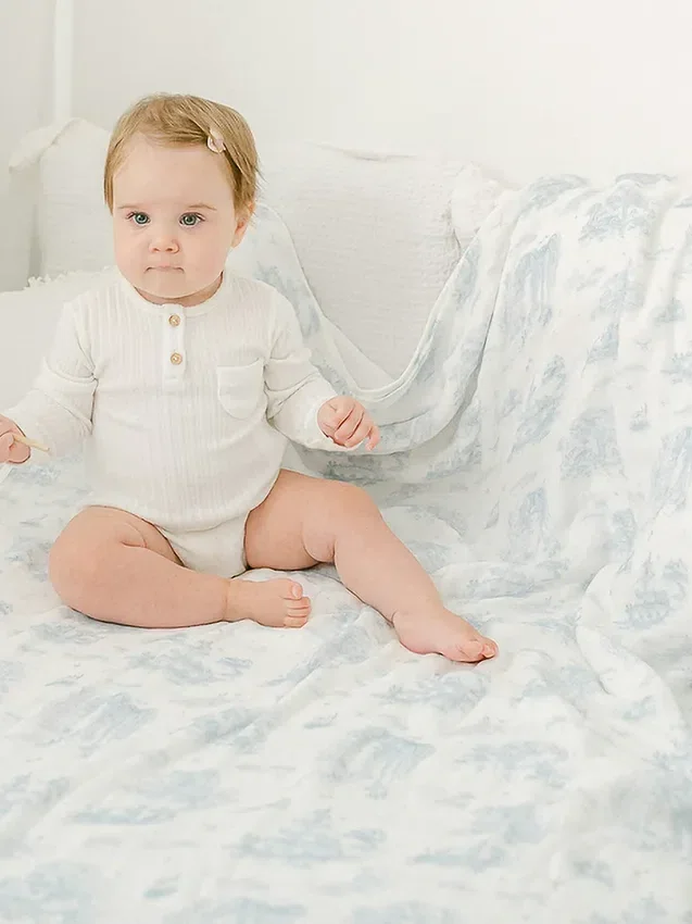 The Gilded Bird: bamboe babydeken met lente-toile-motief