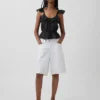 Top met fladdermouwtjes en strik in de taille