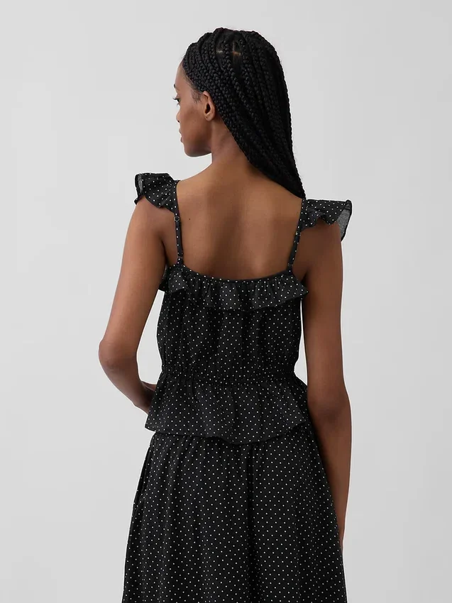 Top met fladdermouwtjes en strik in de taille