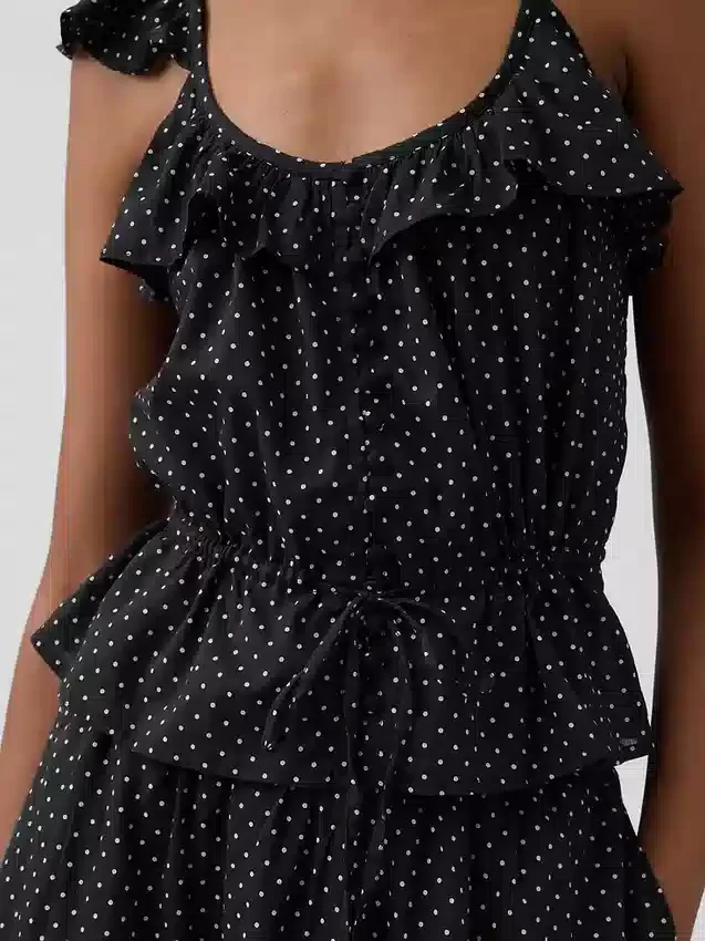 Top met fladdermouwtjes en strik in de taille