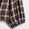 Top met geruite print en strik in de taille