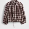 Top met geruite print en strik in de taille