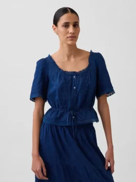 Top met peplum en kanten rand