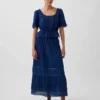 Top met peplum en kanten rand