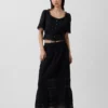 Top met peplum en kanten rand