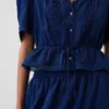 Top met peplum en kanten rand