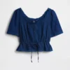 Top met peplum en kanten rand