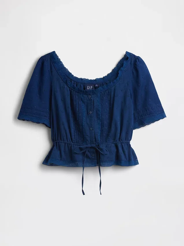 Top met peplum en kanten rand