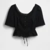 Top met peplum en kanten rand