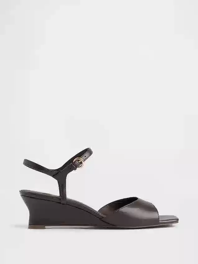 Veganistische sandalen met sleehak