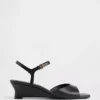 Veganistische sandalen met sleehak