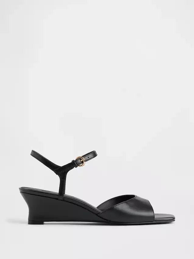 Veganistische sandalen met sleehak